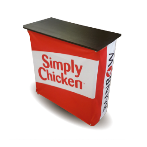 Display counter with steel top for use at events. Red sides with large branding. 