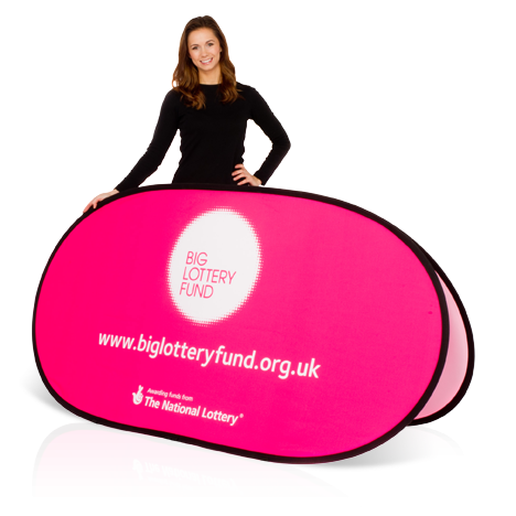 Female model wearing black, holding a pink branded horizontal pop-up banner